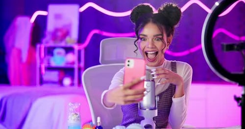 Woman, selfie or influencer in home with microphone, smile or pleasure for social media post online