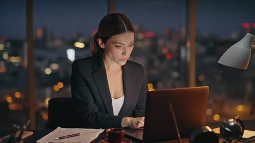 Corporate Professional Working Night Finishing Project in Deadline at Workplace