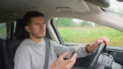 Man Using Smartphone While Driving Car Dangerous Driving