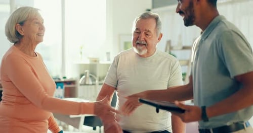 Physiotherapy, handshake and man with senior couple greeting for medical care