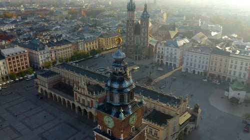 Establishing Aerial Shot of St. Mary's Basilica in Krakow's Old Town.
