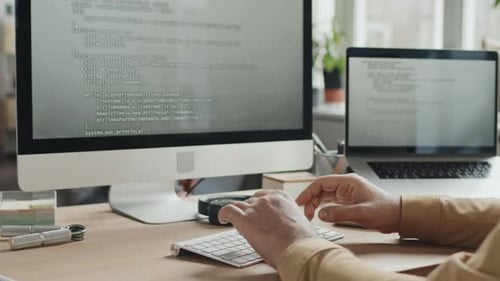 IT Specialist Writing Codes for Computer Program