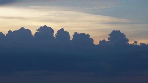 Majestic Blue Clouds at Sunset in Dramatic Sky