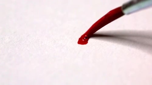 Drawing a red heart with watercolor