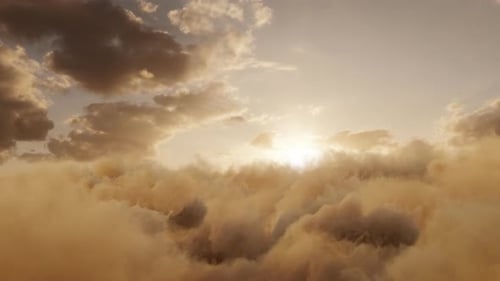 Golden Clouds Moving in a Bright Heavenly Sky