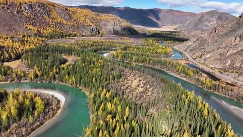 Meandering river in a scenic autumn mountain valley