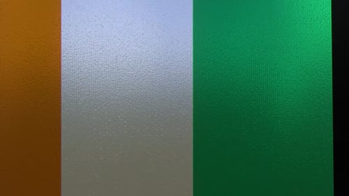 Dynamic Light Shifting Across Textured Vertical Panels