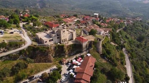 Aerial drone view of Kruje Castle and its fortress, inside the Kruje tower and museum with the mount