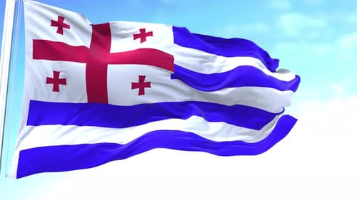Realistic Waving Flag of Adjara Republic on Blue Sky