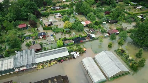 Houses flooded after rain. Aerial view of flood and flooded houses and buildings