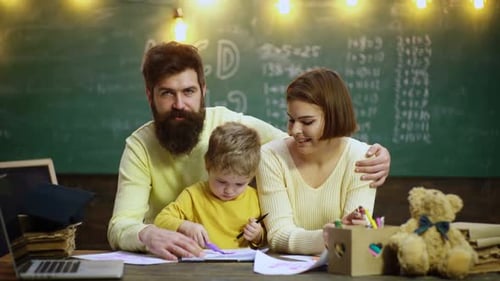 Young Family Studying
