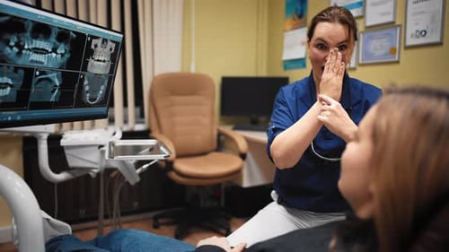 Dental Implantation in Modern Clinic Dentist and Patient Discussing Xrays Professional Stomatologist
