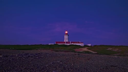 Lighthouse Sending Its Light Beam at Night Cape Espichel Portugal