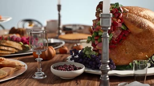 Festive Dinner Table with Roasted Turkey and Assorted Dishes