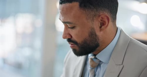 Man Suffering From a Headache in Office