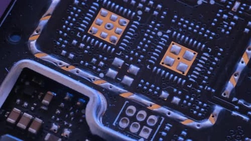 Different types circuits and chip lie on table tracking macro close up. Microcircuits background