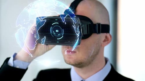 Man Using Virtual Reality Headset with Digital Globe