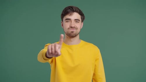 Uninterested Handsome Young Man Disapproving With Stop Finger Sign Dont Play