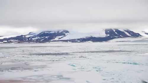 A Breathtaking Expansive View of a Remote Icy Polar Landscape Showcasing Vast Stretches of Sea Ice