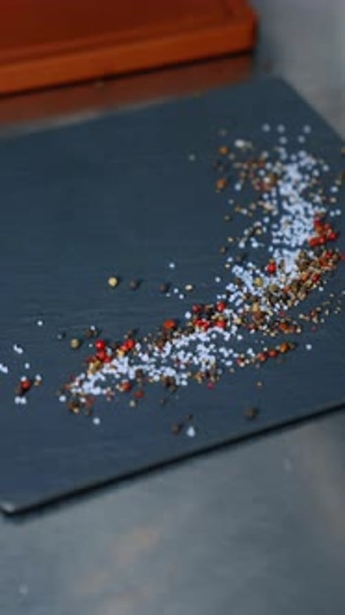 Chef Plating Green Beans With Spices