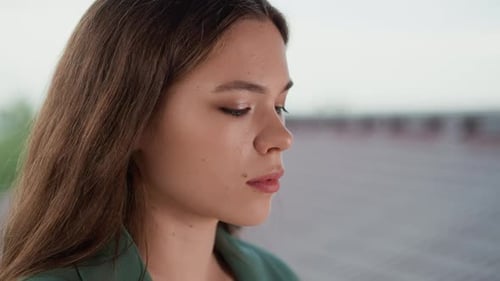 Close Up Of Young Woman Looking Off