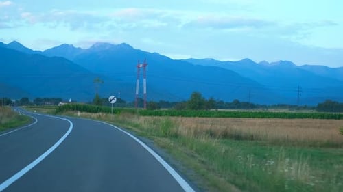 Highway Driving Along European Greenery