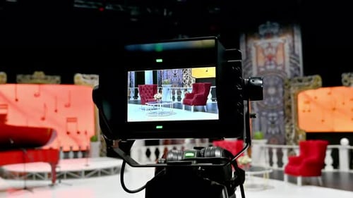 Professional camera filming on the backstage of a TV set