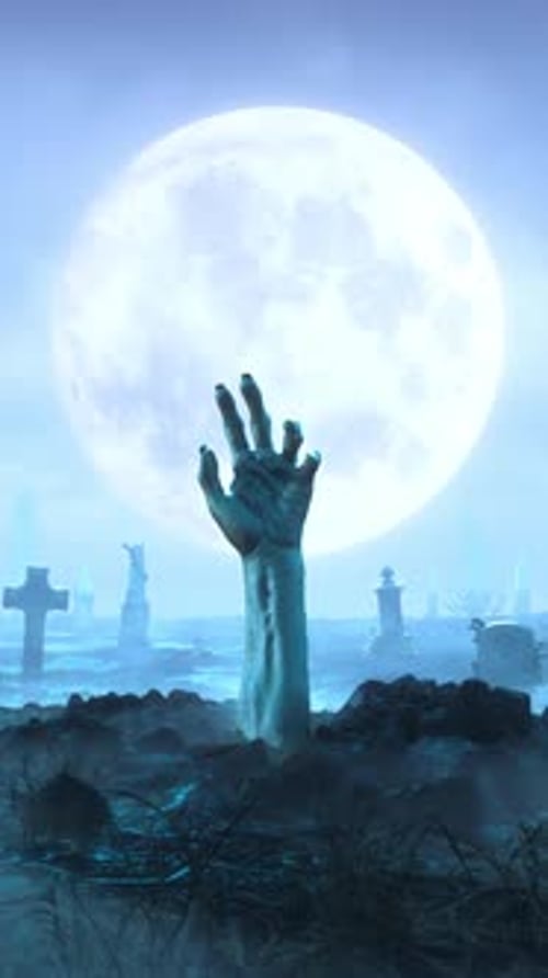 Zombie Hand Crawls Out of the Ground at Night Against the Background of the Moon in the Cemetery