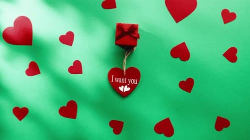 Red Hearts for Valentines Day Green Background