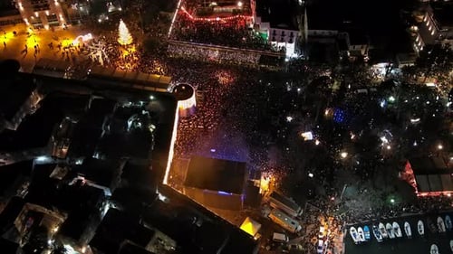 Exciting Aerial View of City Event at Night