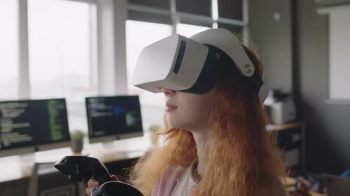 Girl in AR Headset Experiencing Virtual Reality at Coding School