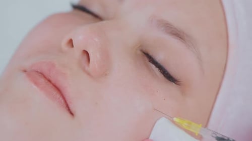 Closeup View of Beauty Injection on Woman's Cheek in Beauty Clinic