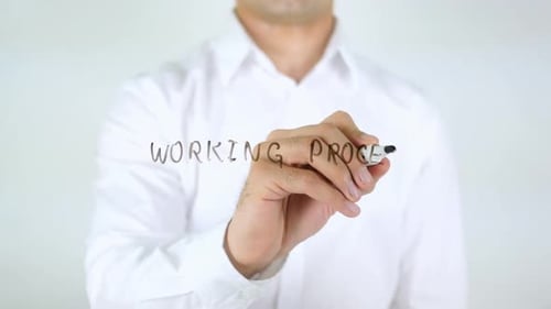 Working Process Man Writing on Glass