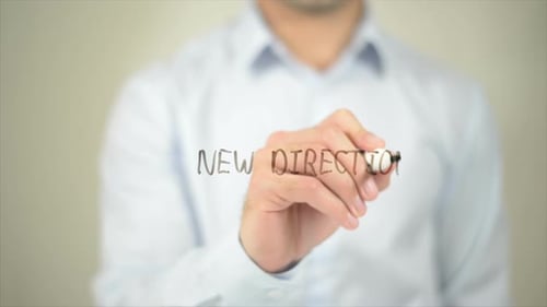 New Direction, Man Writing on Transparent Screen