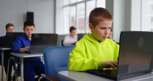 Educational Center For School Students Boy Playing On Computer Video Games Development Classes