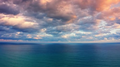 Beautiful Seascape of Winter Clouds During Sunset