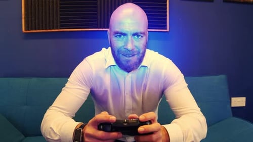 Man Plays Video Games on Controller Inside