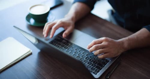 Laptop, hands and businessman in office with typing for research on finance report for budget