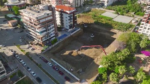 Construction Site with Heavy Equipment in Urban Area