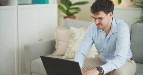 Happy Businessman Working on Computer