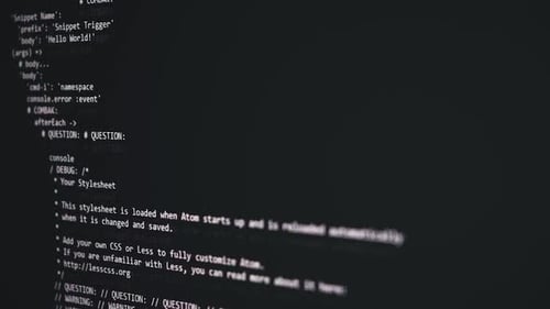 Programmer Coding on Computer