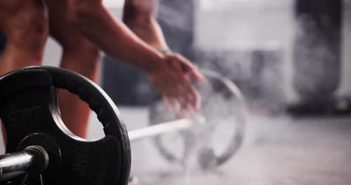 Weightlifting, powder and hands of person in gym for bodybuilder training