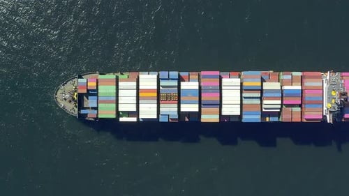4k video footage of a container ship sailing on the ocean