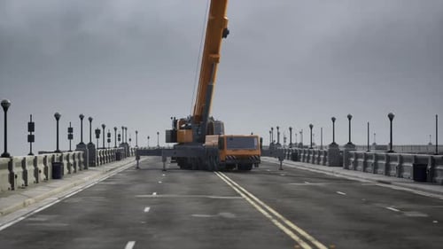 Gran grúa automática en el puente en construcción
