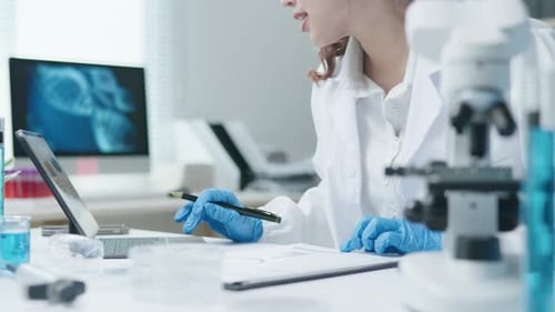 Scientist working test in laboratory for research on pharmacy for medical for disease and virus