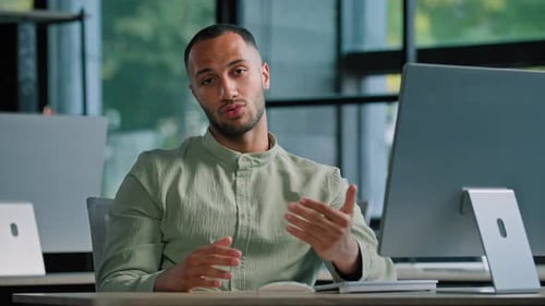 African Talking Man in Office Talk to Camera Webinar Class Lesson Virtual Meeting Businessman