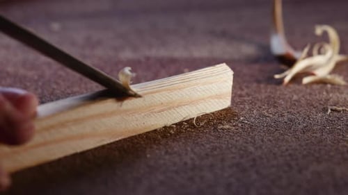 Detailed Woodworking Scene Expert Restorer Refining Pine Surface Under Gentle Studio Lighting Media