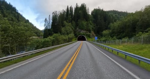 Car rides through the tunnel point-of-view driving in Norway.