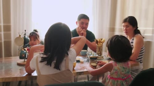 Family enjoying meal together at home