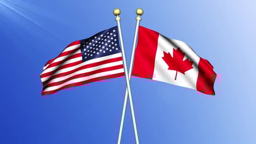 Animated Waving Flags of USA and Canada Against Blue Sky